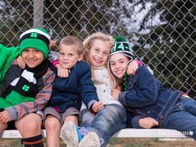 Young 4-H Youth sitting outdoors