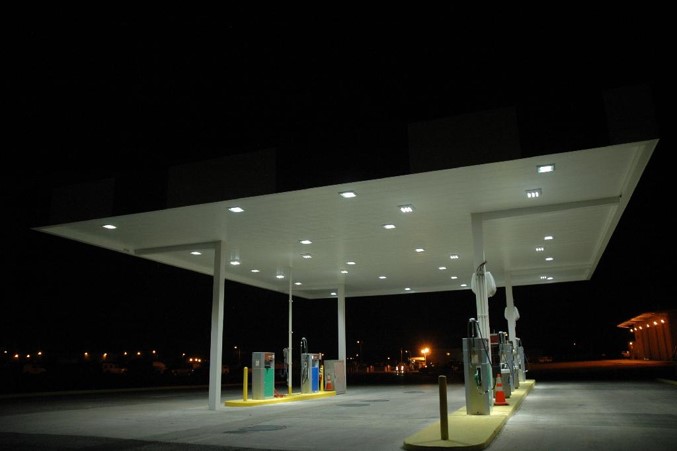 Gas station at night with less intense lights