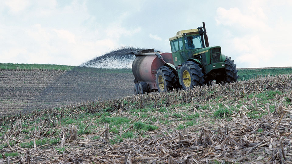 Applying manure to a harvested field