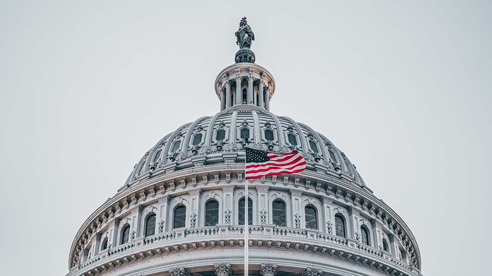 U.S. Capitol Dome with American flag
