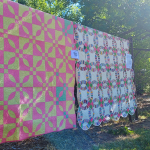 quilts lined up in arboretum