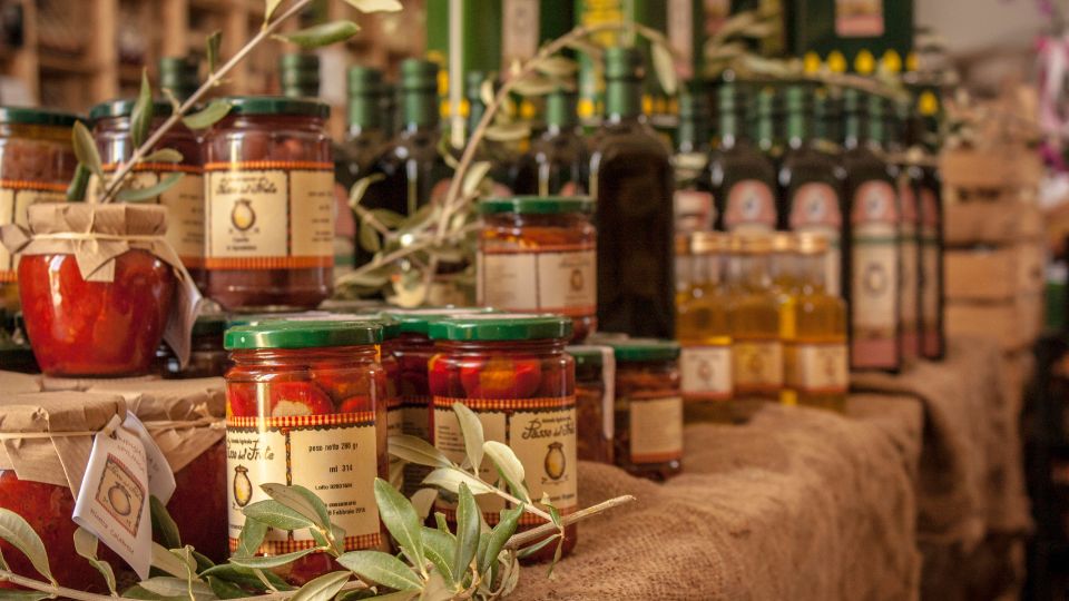 A variety of specialty bottled food sitting on a table