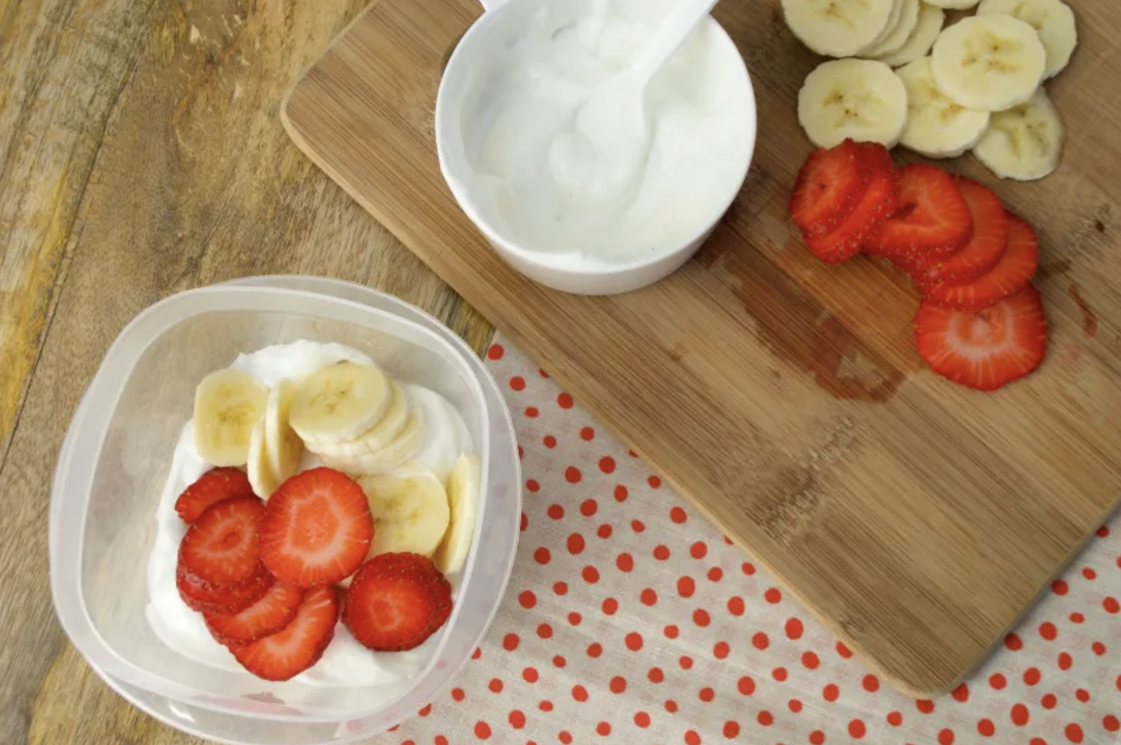 layering fruit on top of yogurt
