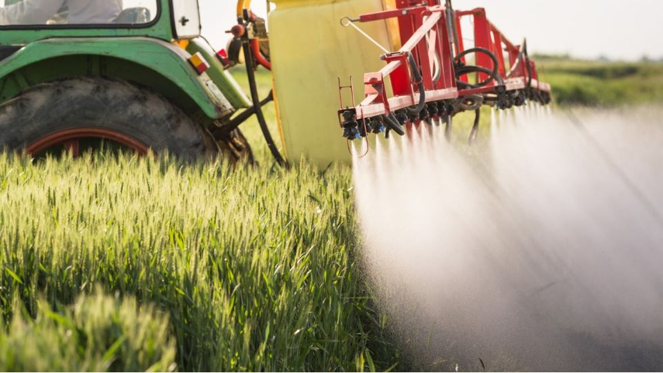 machine spraying crops