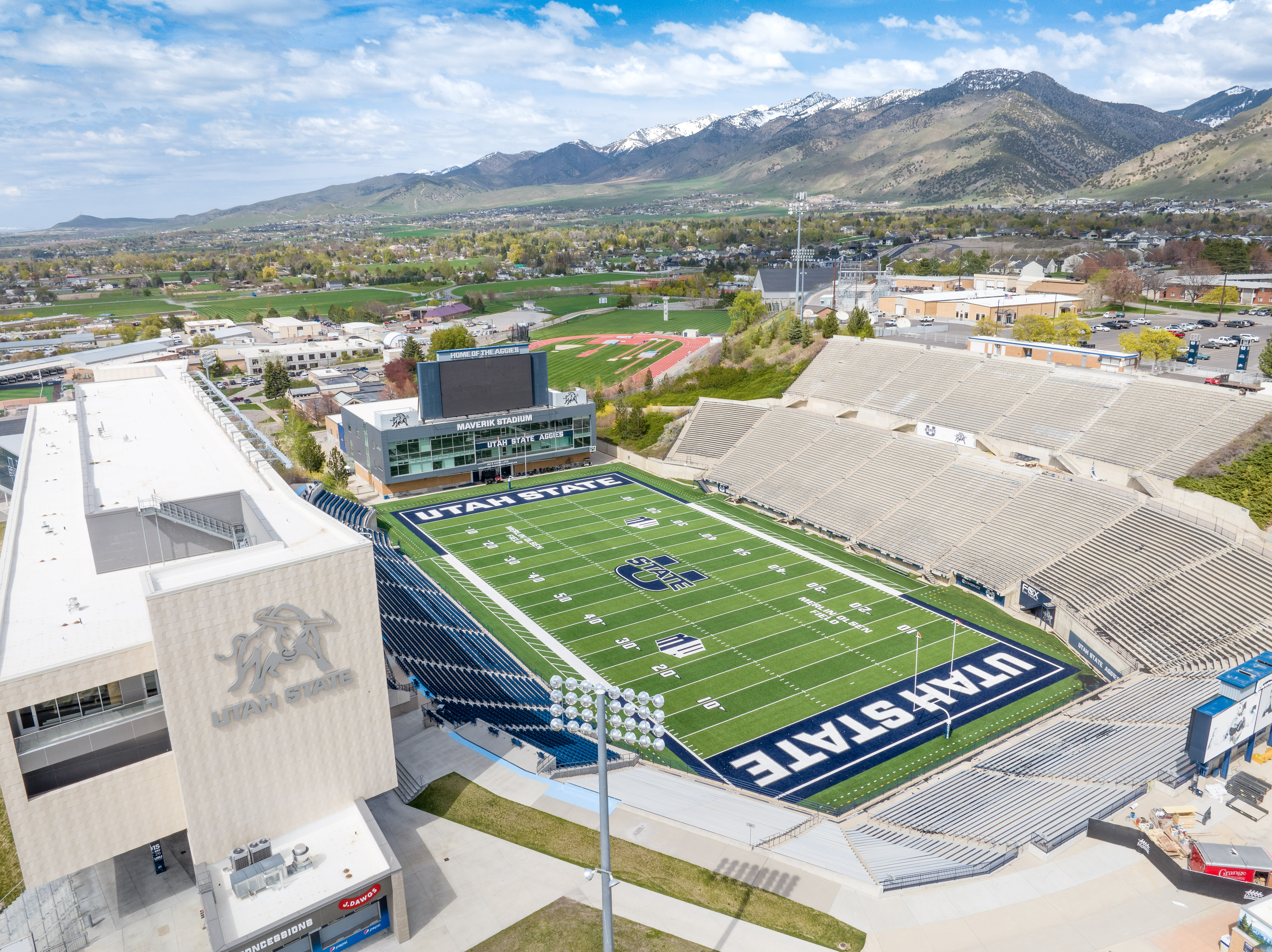 Maverik Stadium, bleachers, and playing field at Utah State University