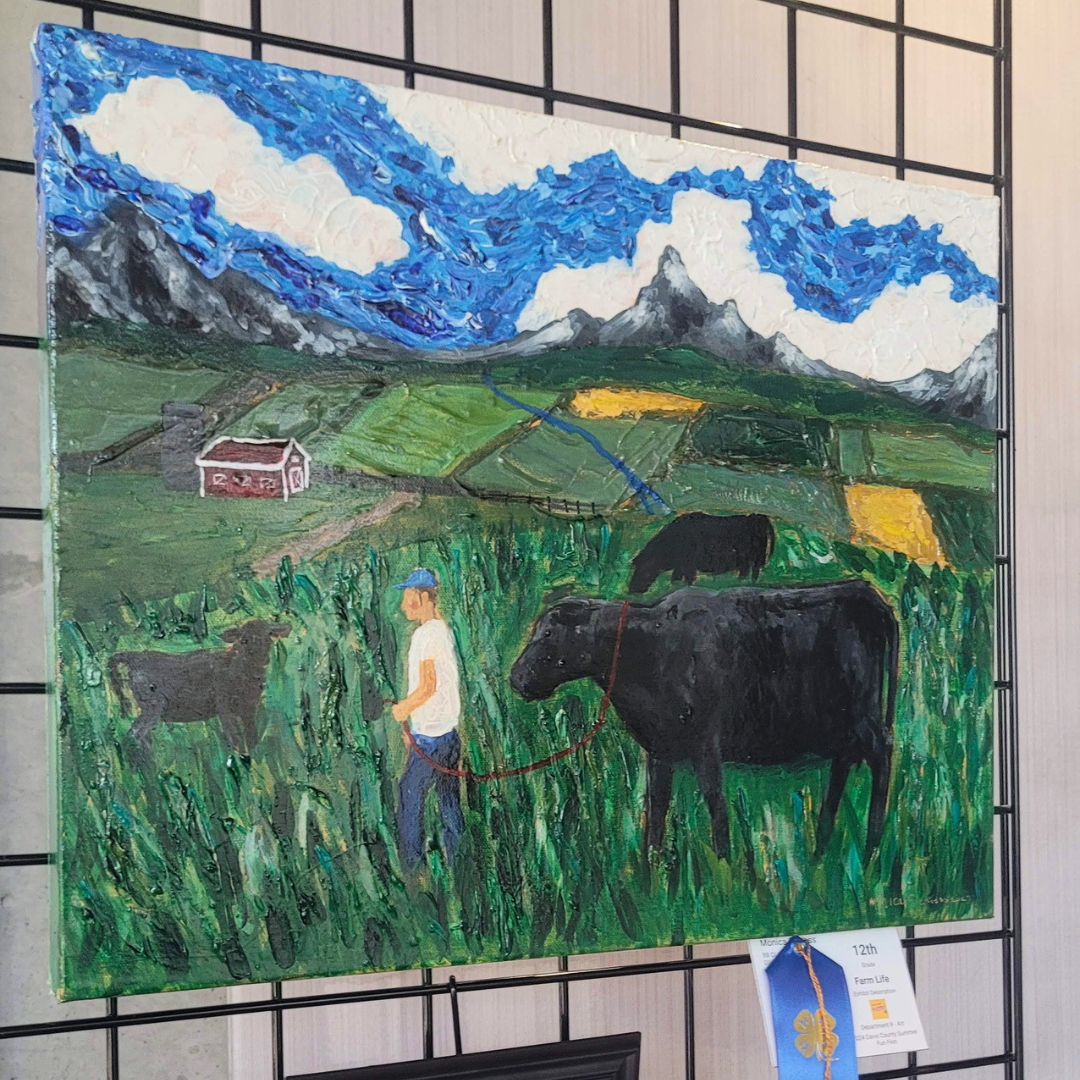 A textured impasto-style oil painting titled "Farm Life," displayed on a wire grid wall with a blue 4-H ribbon and label. The painting depicts a person in a blue cap leading a large black cow through a lush green field, with a red barn, patchwork farmland, mountains, and swirling Van Gogh-inspired blue sky in the background.