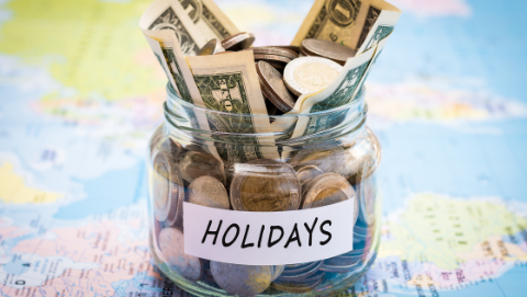 jar of money labeled holiday
