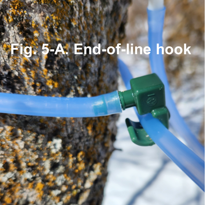 Blue tubing looped around a tree and connected with a hook. Text reads "Fig. 5-A. End-of-line hook"