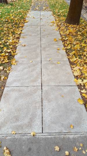 fixed sidewalk on 1375 E. 1500 N.