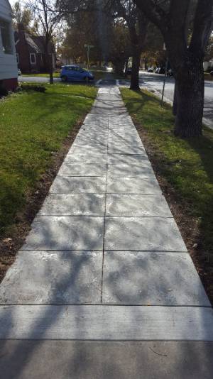 fixed sidewalk on 205 E. 600 N.