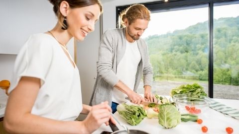 couple cooking together