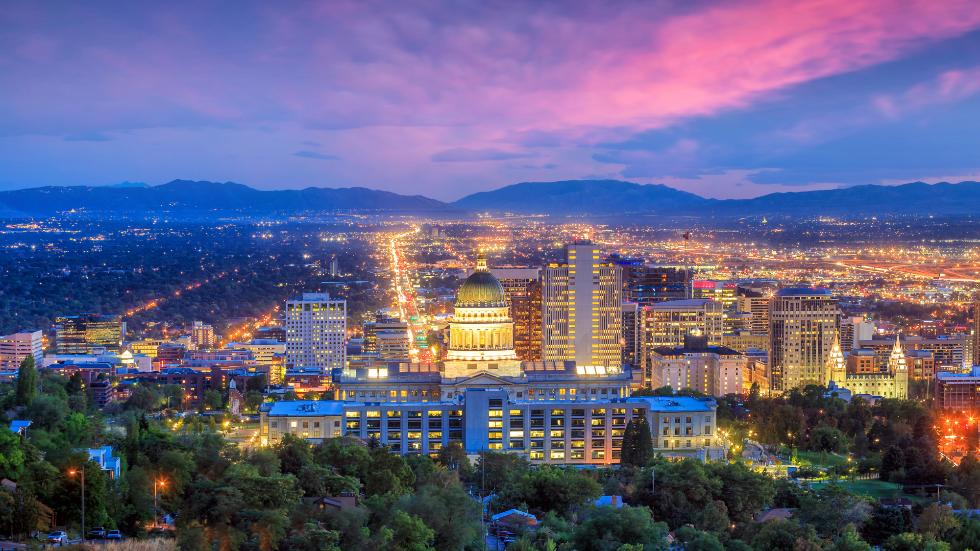sunset over salt lake city with Utah State Capitol in the foreground