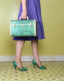 person wearing purple dress with green shoes