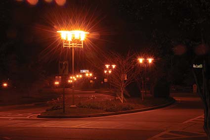 Cluttered light posts in road island
