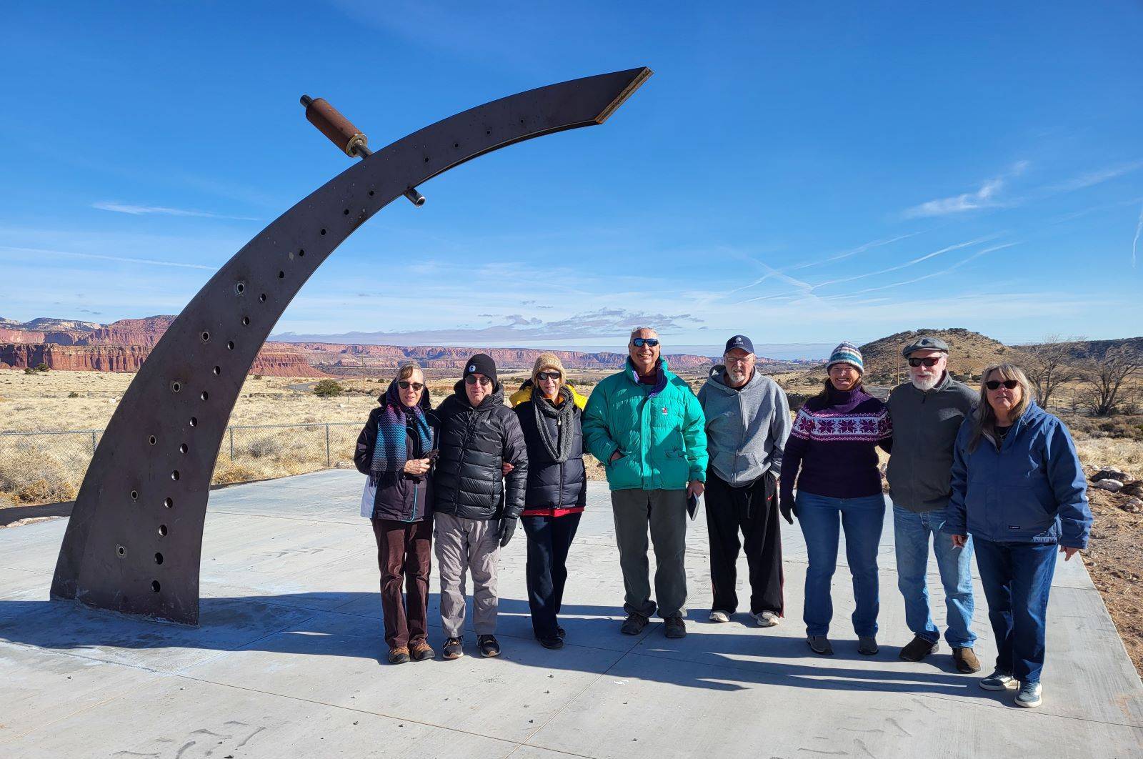 The Winter Solstice group at solar noon under the solar fin. Barb Walkush and Gary Pankow third and fourth from the left.