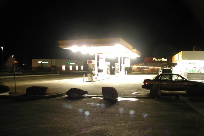 Gas station at night with glaring lights