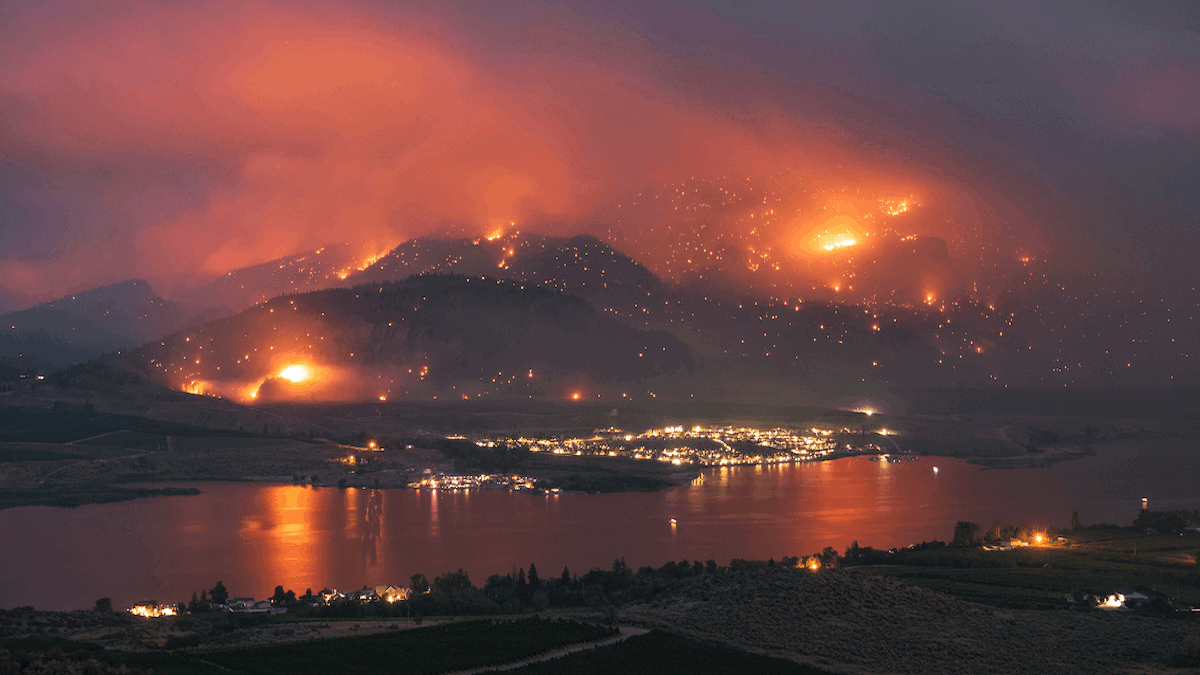Gateway community neighborhood near public lands with surrounding forested wildfire risk area