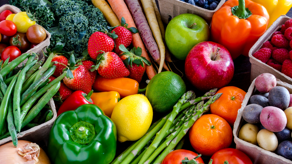 A variety of colorful fruits, berries, and vegetables.