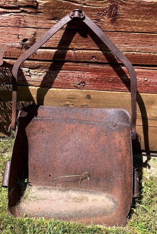 An old and rusted scraper.