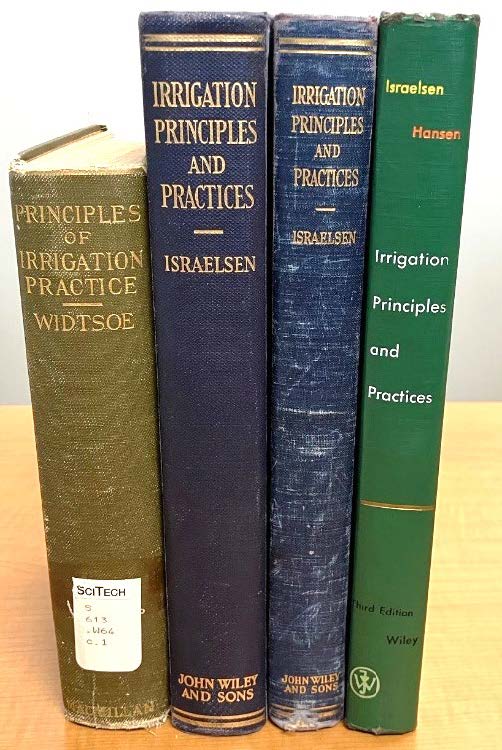 Four old textbooks.