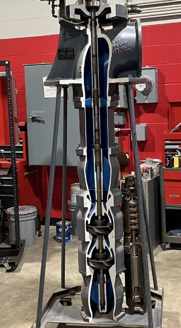 A model of a turbine pump that is verticle.