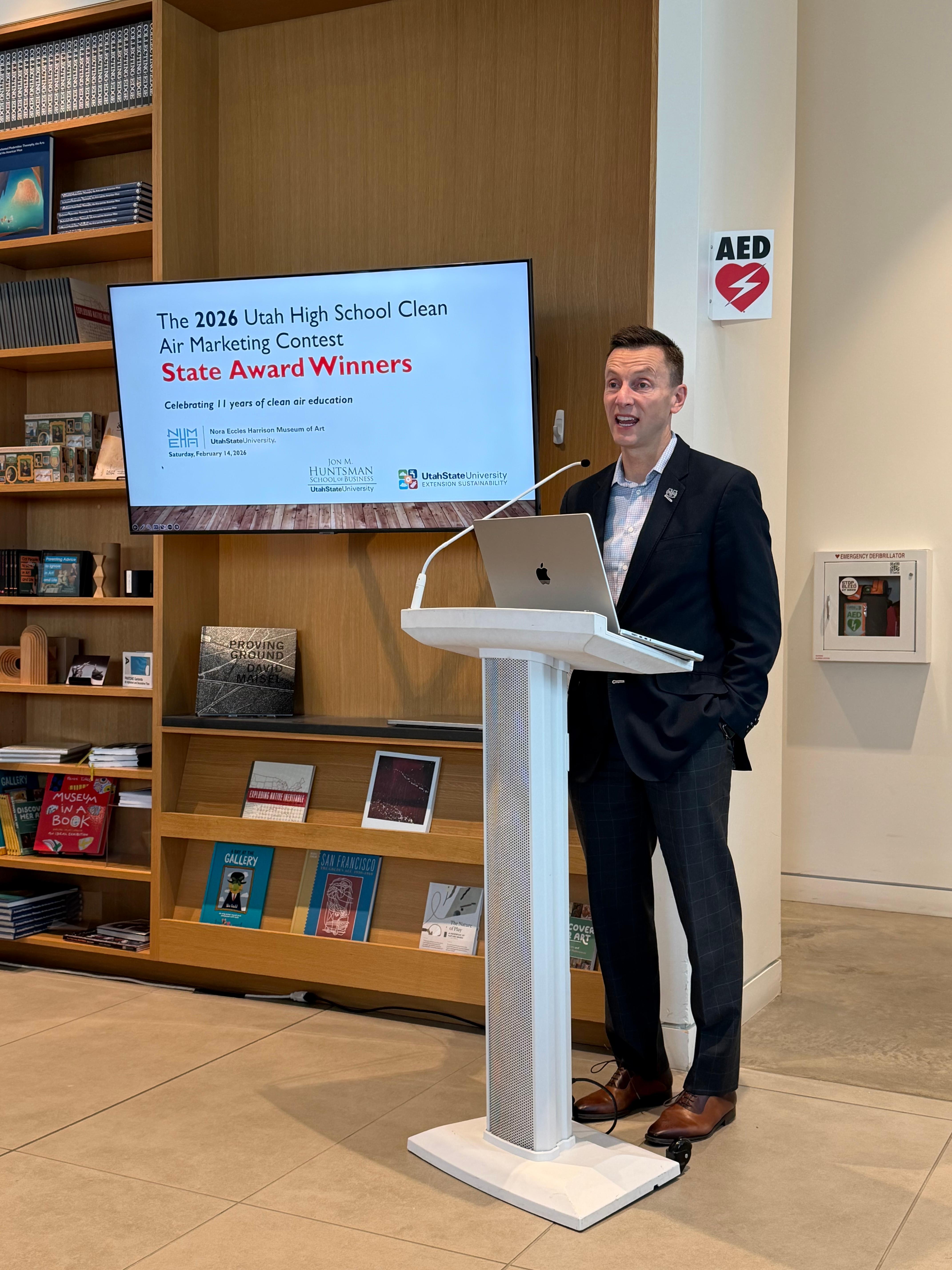 USU President Brad Mortensen congratulating the 2026 winners.