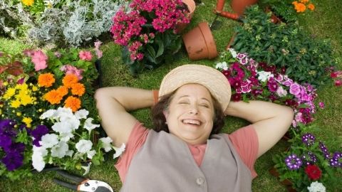 Woman smiling in her garden