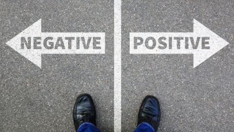 Arrows pointing in opposite directions saying negative and positive