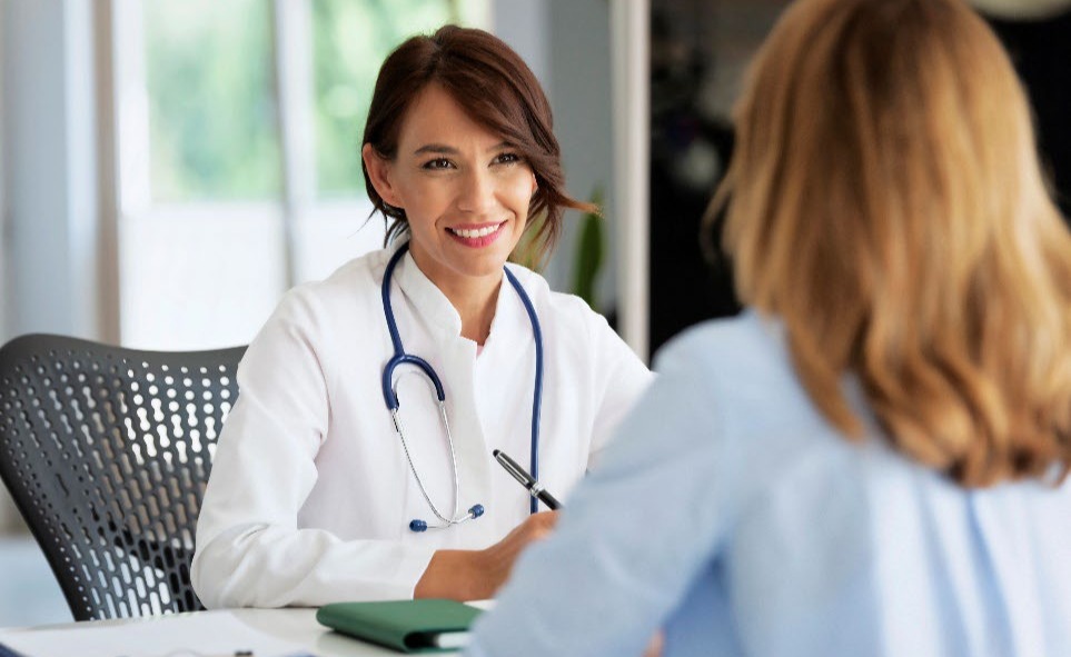 A doctor talking to a patient.