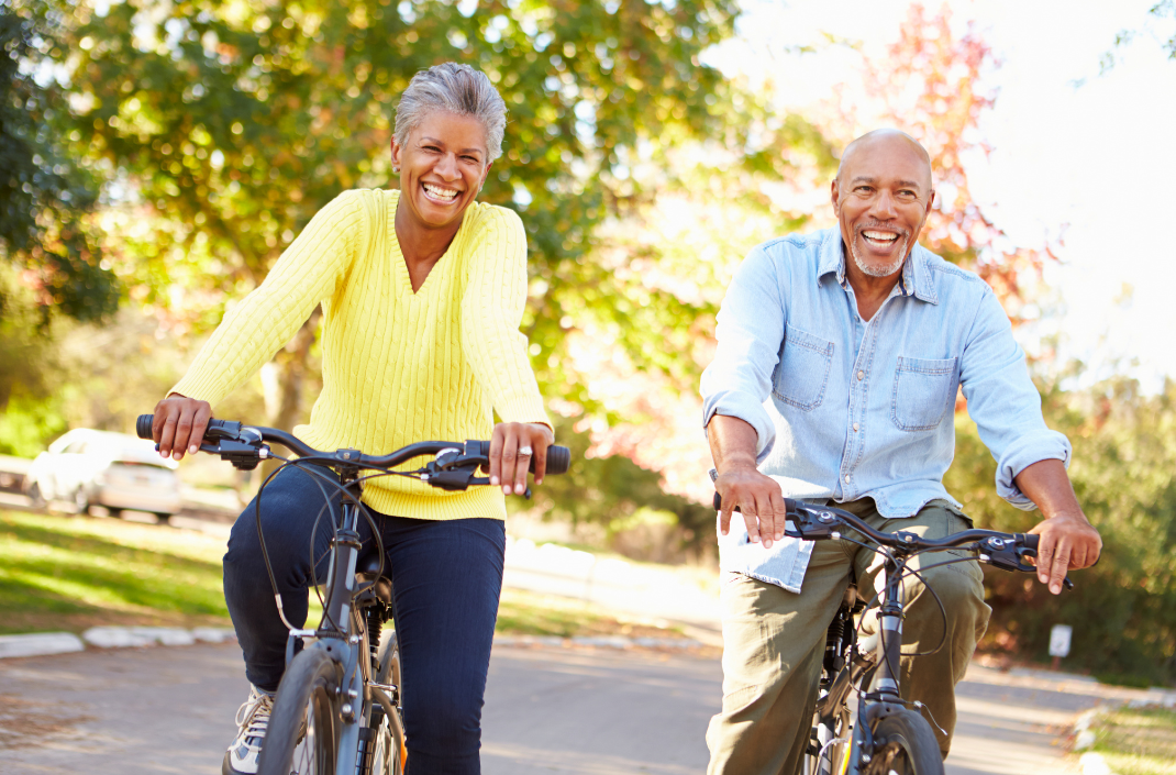 Older Couple Riding Bikes