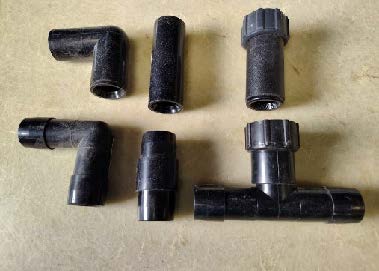 Compression fittings used to join irrigation tubing.