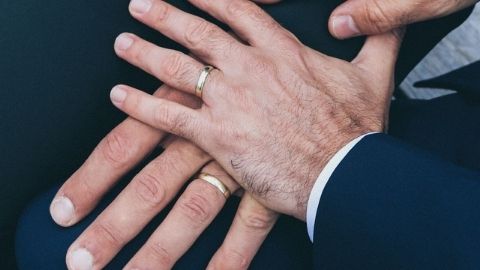 hands with wedding bands
