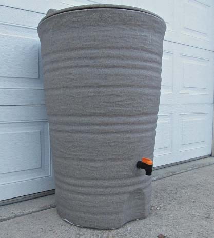 Rock textured gray rain barrel with spout