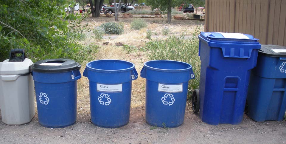 Variety of recycle containers of differet shapes and labeled differently