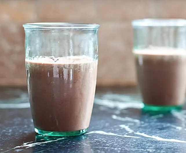 Creamy brown smoothie in a glass