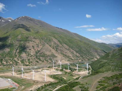 Wind turbines in mouth of a canyon