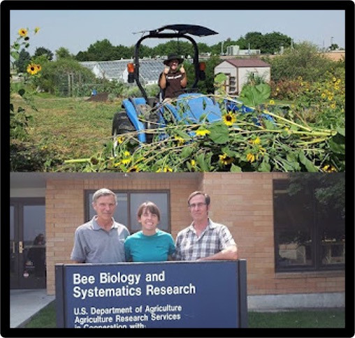 person using a tractor, and people standing behind a sign