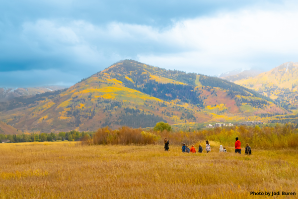 Kids walking Swaner Nature Preserve during vibrant autumn colors