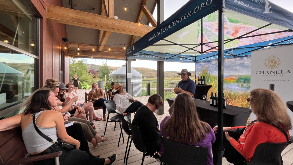 group on back deck listening to wine educator