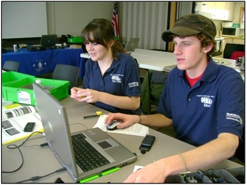 Citizen scientists working at a computer